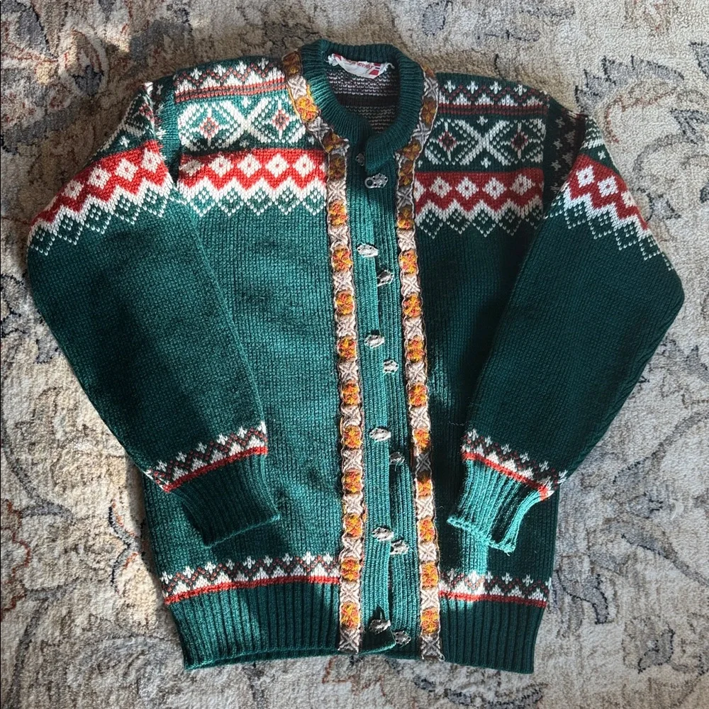 This is a vintage 90s Eddie Bauer Nordic wool blend cardigan sweater in green